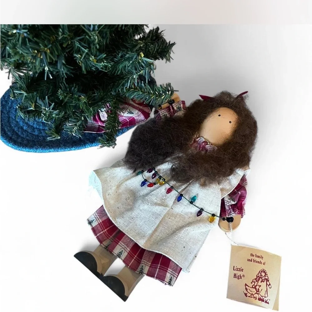 Handcrafted Lizzie High wooden doll with Christmas tree-